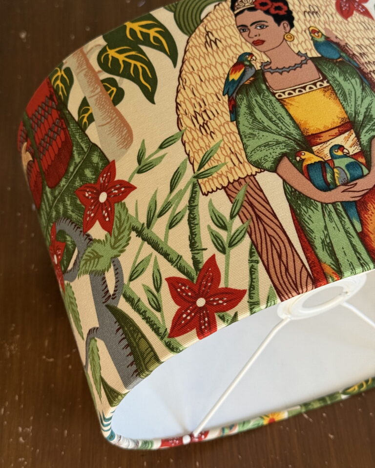 Handcrafted Frida Kahlo inspired lampshade with tropical floral design and parrots – artistic handmade lighting by Chantier Studio.